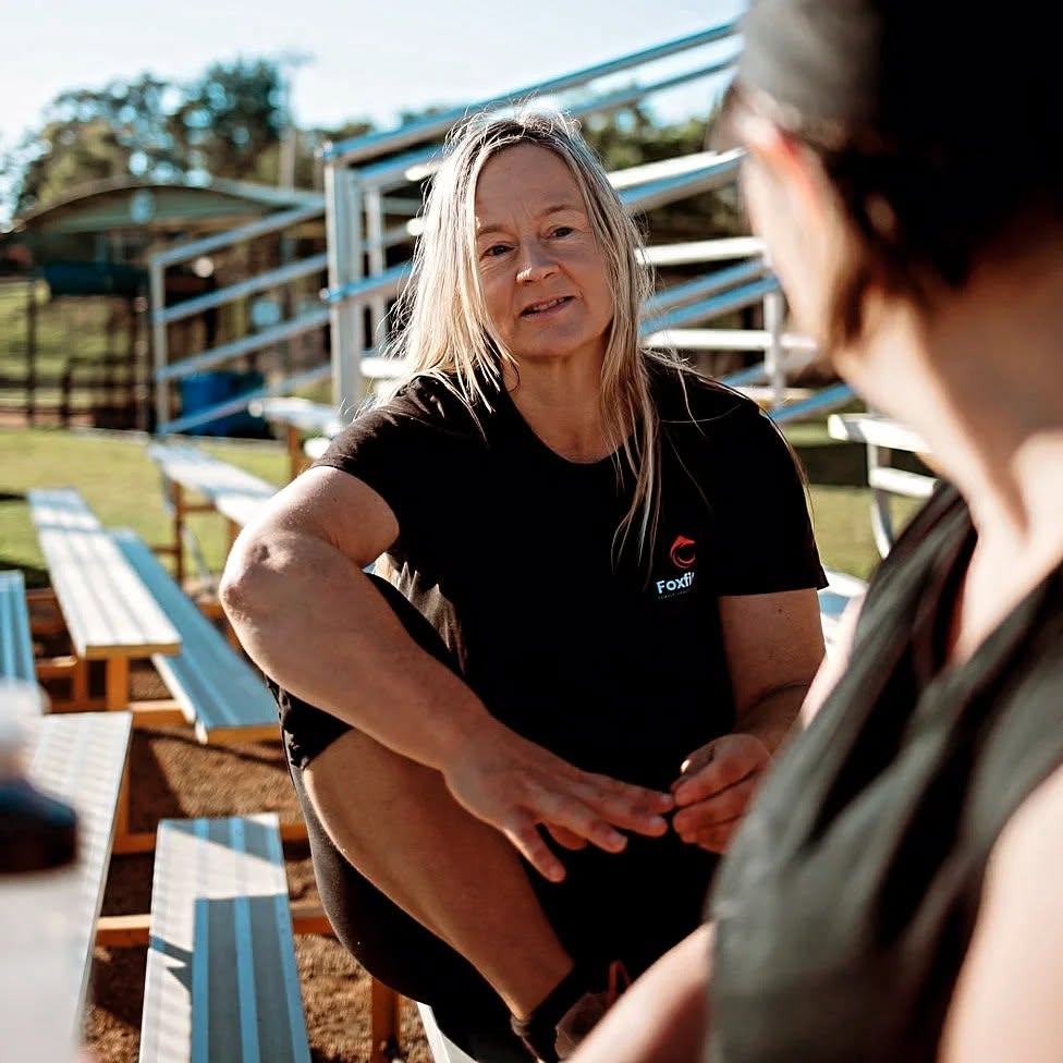 Female coach chatting one-on-one during menopause coaching in Canberra